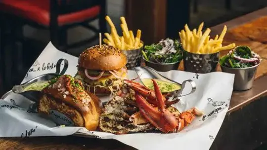 Burger and lobster combo meal with burger, fries and lobster